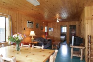 Woodsy living room showcasing classic pine furniture and natural decor.