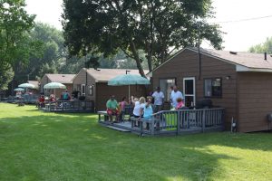 Families enjoying lunch on their private decks with BBQ's.